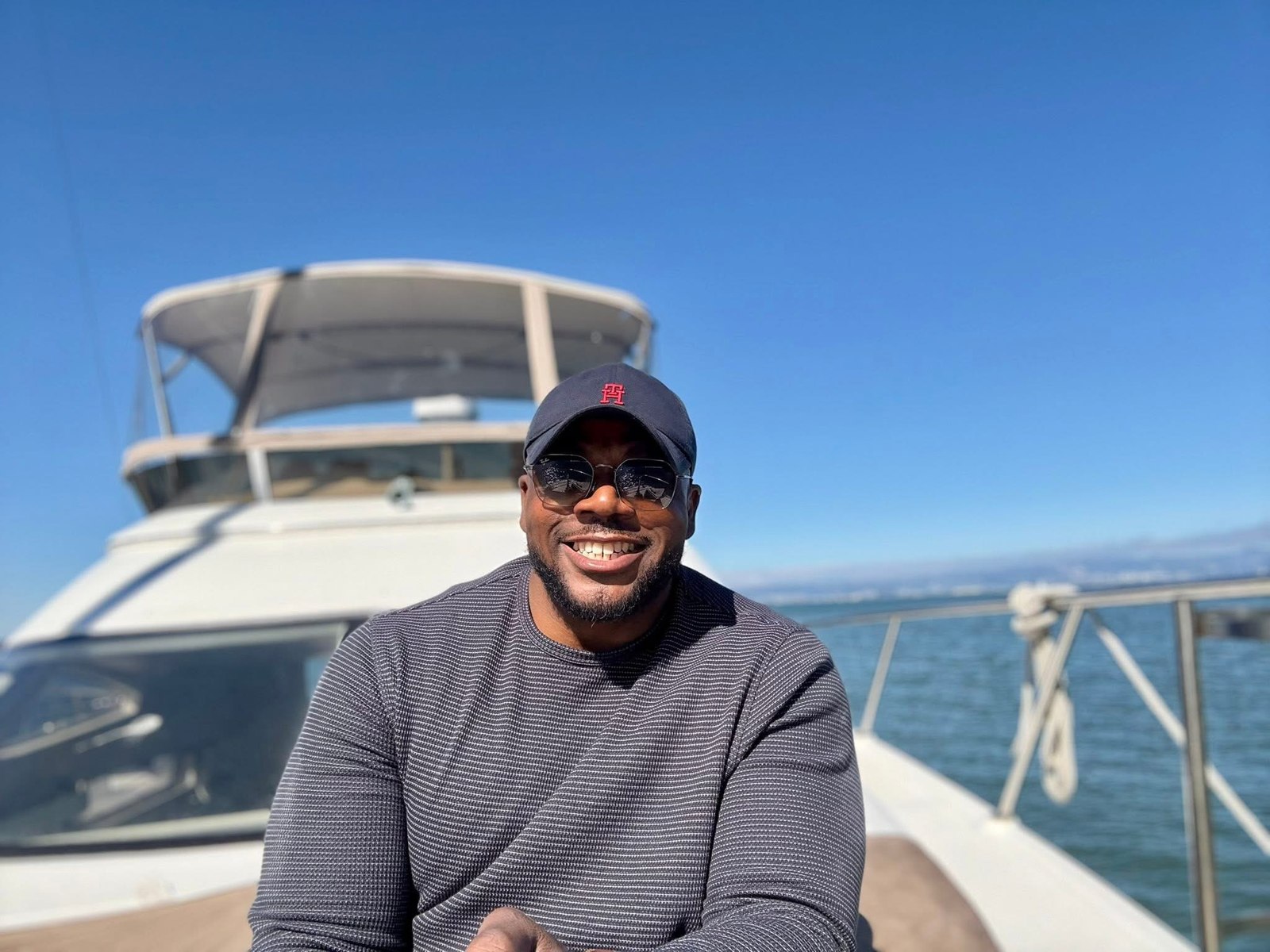 Original captain and yacht photo